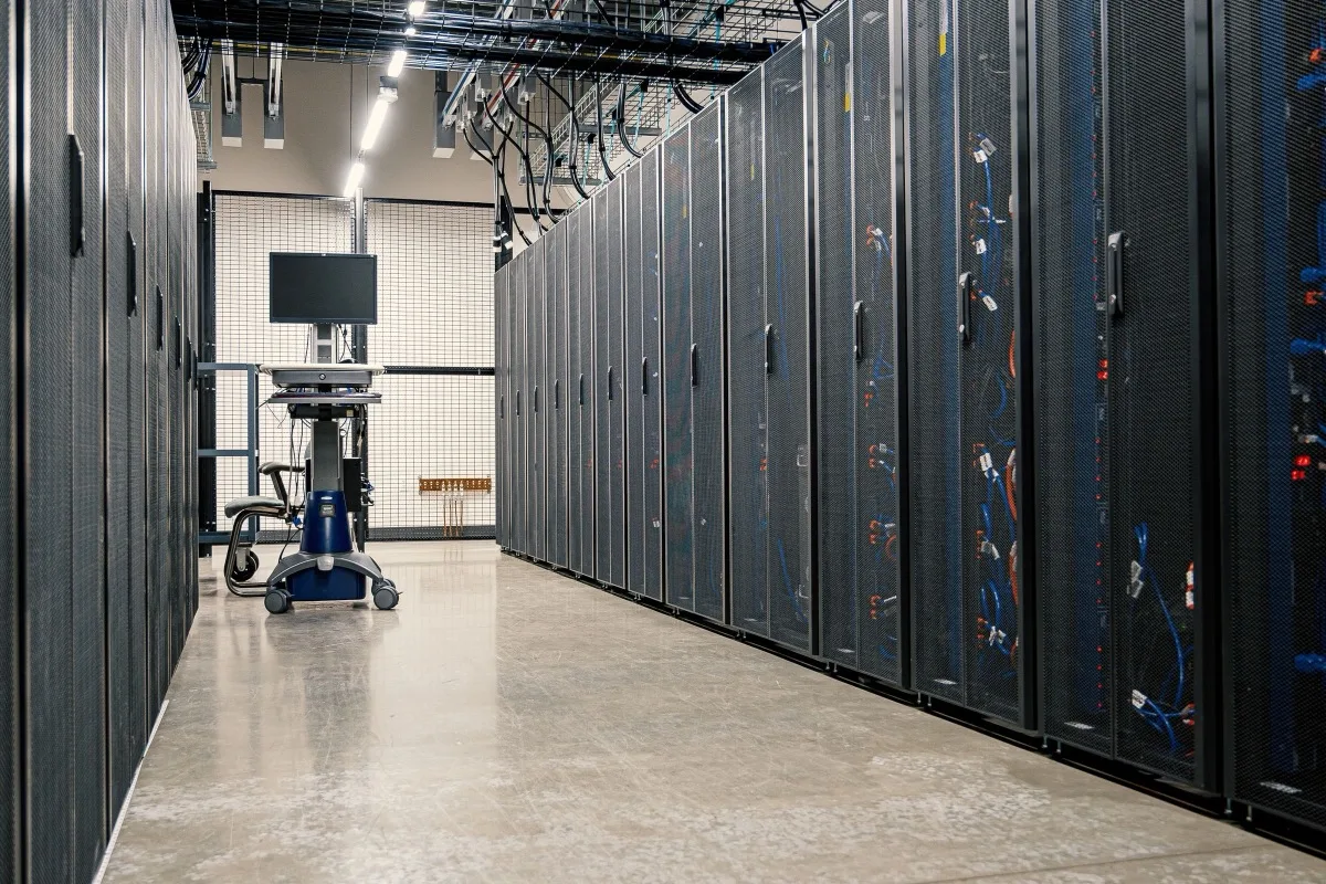 Server racks lining a data center corridor